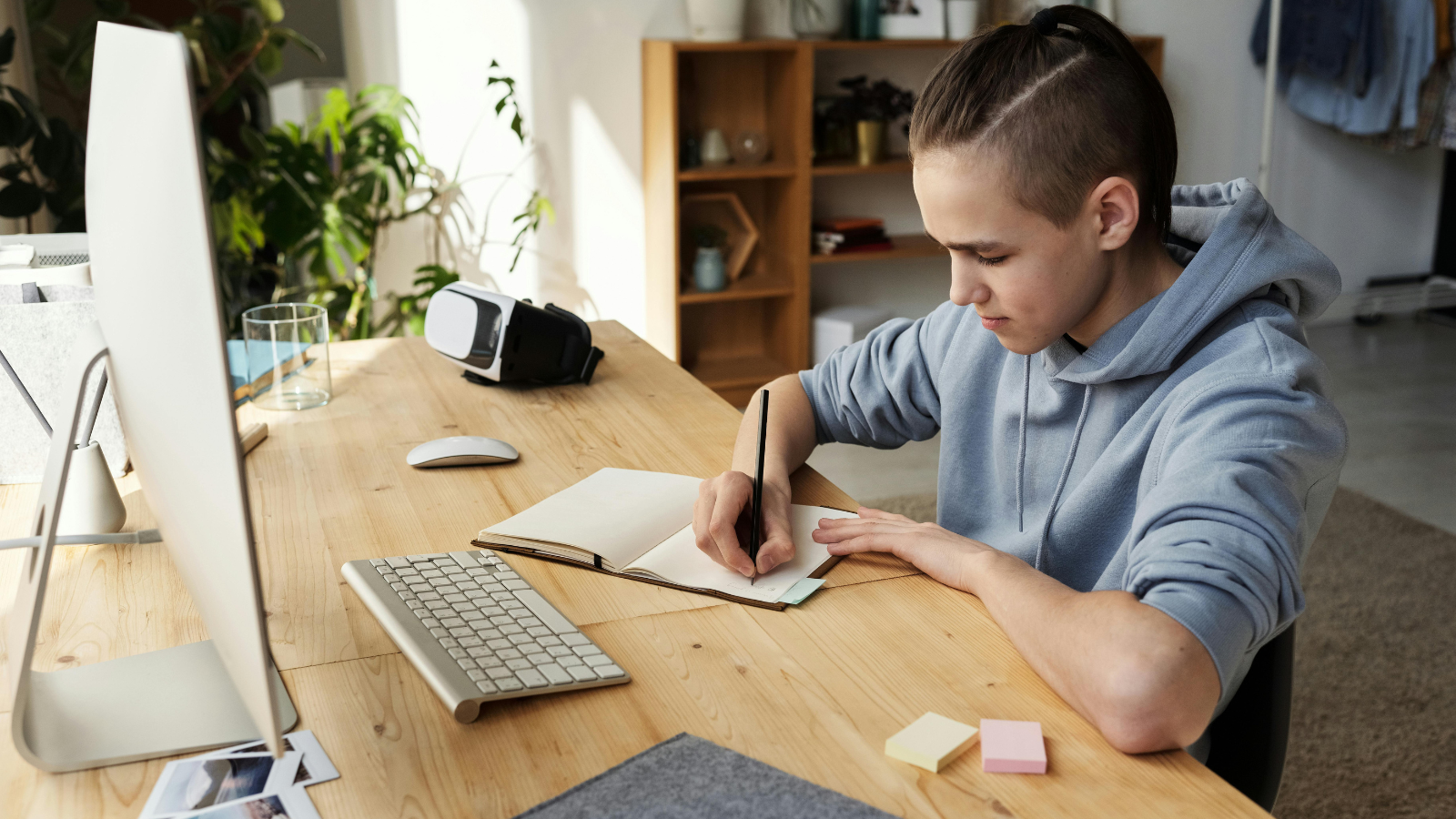 Young male student, homeschooling with NEC